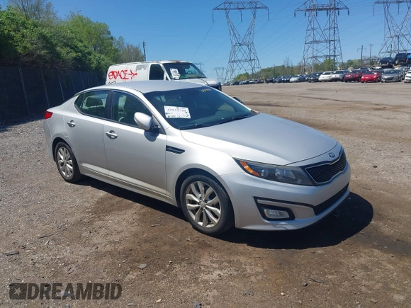 2014 Kia Optima LX with VIN 5XXGM4A72EG339998, listed as a IAAI auction lot 42132720 with 186,989 mi miles. Bid and sale history available at carsss.com. Image 1.