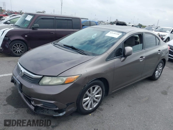 2012 Honda Civic EX with VIN 2HGFB2F89CH517330, listed as a IAAI auction lot 42116208 with 196,861 mi miles and . Bid and sale history available at DreamBid. Image 17.