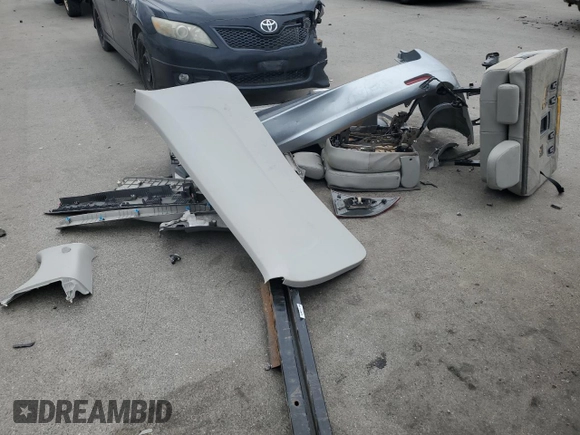 2011 Toyota Sienna XLE z VIN 5TDDK3DC1BS018203, wystawiony jako Copart lot #58807795 z przebiegiem 103 177 mil mil oraz Szkoda całkowita • Salvage title. Historia ofert i sprzedaży dostępna na DreamBid. Obrazek 13.