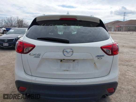 2014 Mazda CX-5 Grand Touring with VIN JM3KE4DY8E0397330, listed as a IAAI auction lot 41868116 with 180,891 mi miles. Bid and sale history available at carsss.com. Image 16.