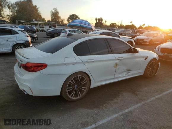 2019 BMW M5 z VIN WBSJF0C53KB284878, wystawiony jako Copart lot #86763564 z przebiegiem Nie podano mil oraz Szkoda całkowita • Salvage title. Historia ofert i sprzedaży dostępna na DreamBid. Obrazek 3.