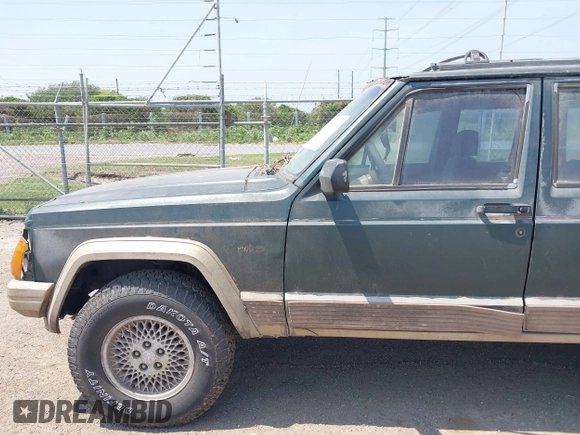 1994 Jeep Cherokee z VIN 1J4FT78S0RL149062, wystawiony jako IAAI lot #41925110 z przebiegiem 281 893 mil mil oraz . Historia ofert i sprzedaży dostępna na DreamBid. Obrazek 13.