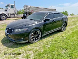 2013 Ford Taurus SHO z VIN 1FAHP2KT6DG144172, wystawiony jako Copart lot #63161585 z przebiegiem Nie podano mil oraz Czysty tytuł • Clean title. Historia ofert i sprzedaży dostępna na DreamBid. Obrazek 2.