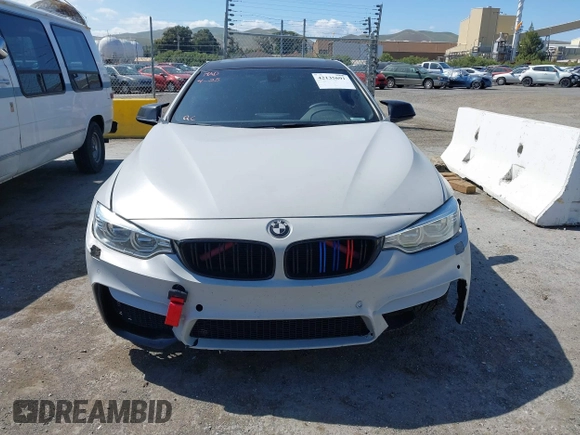 2015 BMW 4 Series 428i xDrive with VIN WBA4C9C54FD330582, listed as a IAAI auction lot 42135691 with 127,289 mi miles and . Bid and sale history available at DreamBid. Image 11.