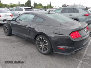 2022 Ford Mustang EcoBoost with VIN 1FA6P8TH2N5135583, listed as a IAAI auction lot 42280818 with 18,377 mi miles and . Bid and sale history available at DreamBid. Image 3.