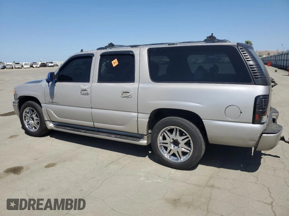 2006 GMC Yukon XL with VIN 1GKFK66U36J134459, listed as a Copart auction lot 55802165 with 277,366 mi miles and Salvage title. Bid and sale history available at DreamBid. Image 2.