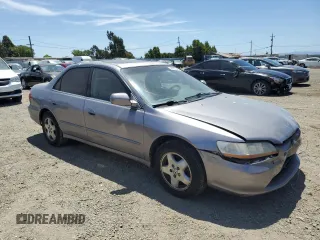 2000 Honda Accord EX with VIN 1HGCG1654YA059755, listed as a Copart auction lot 59003345 with 160,309 mi miles and Salvage title. Bid and sale history available at DreamBid. Image 4.