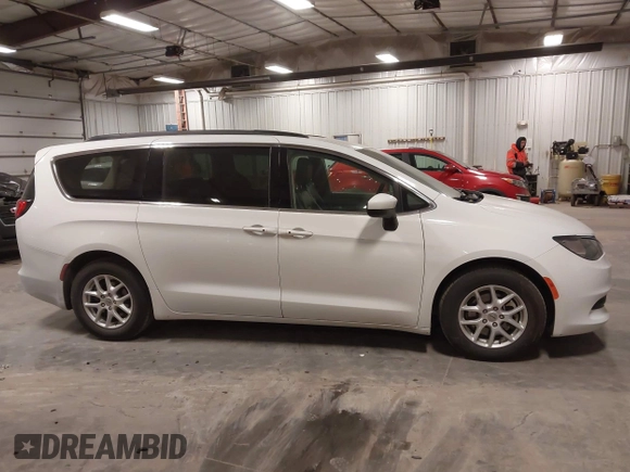 2021 Chrysler Voyager LXi with VIN 2C4RC1DG5MR508956, listed as a IAAI auction lot 41547647 with 104,563 mi miles and . Bid and sale history available at DreamBid. Image 14.