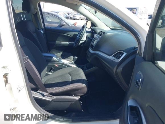 2014 Dodge Journey SE with VIN 3C4PDCAB4ET193896, listed as a IAAI auction lot 42126565 with 242,108 mi miles and . Bid and sale history available at carsss.com. Image 5.