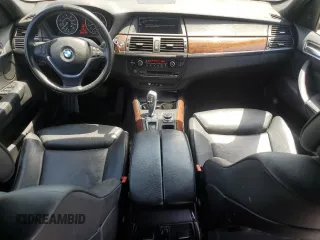2012 BMW X5 35i z VIN 5UXZV4C51CL744313, wystawiony jako Copart lot #58270755 z przebiegiem 97 903 mil mil oraz Szkoda całkowita • Salvage title. Historia ofert i sprzedaży dostępna na DreamBid. Obrazek 8.