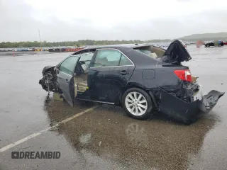 2012 Toyota Camry XLE z VIN 4T1BD1FK8CU001921, wystawiony jako Copart lot #57861715 z przebiegiem Nie podano mil oraz Szkoda całkowita • Salvage title. Historia ofert i sprzedaży dostępna na DreamBid. Obrazek 2.