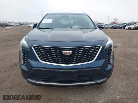 2021 Cadillac XT4 FWD Premium Luxury with VIN 1GYFZCR41MF041306, listed as a IAAI auction lot 41143747 with 53,116 mi miles. Bid and sale history available at carsss.com. Image 12.