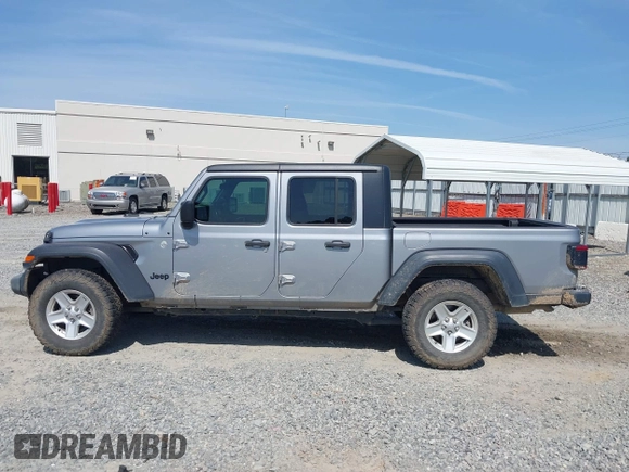 2020 Jeep Gladiator Sport S with VIN 1C6HJTAG7LL128940, listed as a IAAI auction lot 42108154 with 90,596 mi miles and . Bid and sale history available at DreamBid. Image 14.