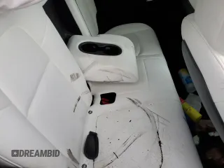 2021 Tesla Model Y Standard Range z VIN 5YJYGDED1MF109091, wystawiony jako Copart lot #50414004 z przebiegiem Nie podano mil oraz Szkody całkowita. Historia ofert i sprzedaży dostępna na DreamBid. Obrazek 10.