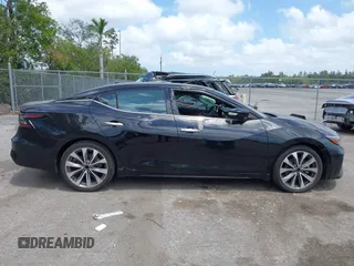 2023 Nissan Maxima Platinum z VIN 1N4AA6FV0PC502349, wystawiony jako IAAI lot #42114011 z przebiegiem 7 494 mil mil oraz . Historia ofert i sprzedaży dostępna na DreamBid. Obrazek 13.