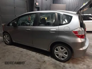2010 Honda Fit with VIN JHMGE8H29AS020675, listed as a IAAI auction lot 41832465 with 212,713 mi miles. Bid and sale history available at carsss.com. Image 3.