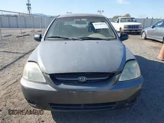 2004 Kia Rio with VIN KNADC125246339415, listed as a IAAI auction lot 41978078 with 127,727 mi miles. Bid and sale history available at carsss.com. Image 6.
