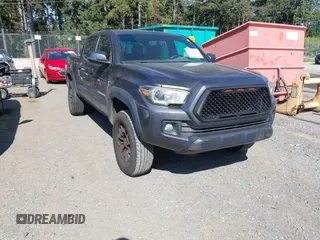 2016 Toyota Tacoma SR with VIN 3TMCZ5AN2GM034717, listed as a IAAI auction lot 42771366 with 91,703 mi miles and . Bid and sale history available at DreamBid. Image 1.