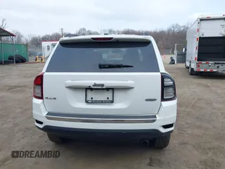 2016 Jeep Compass Latitude with VIN 1C4NJDEBXGD737018, listed as a IAAI auction lot 41800071 with 158,006 mi miles. Bid and sale history available at carsss.com. Image 16.
