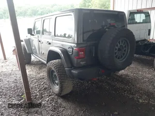 2021 Jeep Wrangler Unlimited Rubicon with VIN 1C4JJXFM6MW538774, listed as a IAAI auction lot 42368651 with 49,490 mi miles and . Bid and sale history available at DreamBid. Image 3.