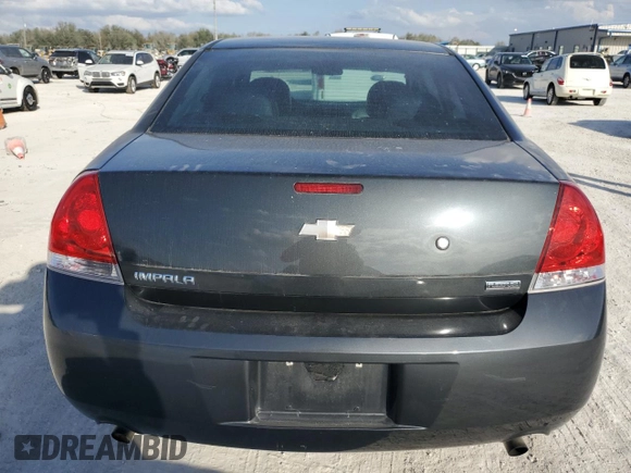 2013 Chevrolet Impala Police z VIN 2G1WD5E39D1261192, wystawiony jako Copart lot #45577065 z przebiegiem 53 892 mil mil oraz Szkoda całkowita • Salvage title. Historia ofert i sprzedaży dostępna na DreamBid. Obrazek 6.
