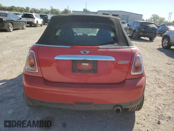 2009 MINI Convertible z VIN WMWMR335X9TU95073, wystawiony jako Copart lot #73690884 z przebiegiem 63 888 mil mil oraz Szkoda całkowita • Salvage title. Historia ofert i sprzedaży dostępna na DreamBid. Obrazek 6.