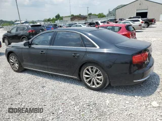 2012 Audi A8 with VIN WAURVAFDXCN026781, listed as a Copart auction lot 59197615 with 160,567 mi miles and Salvage title. Bid and sale history available at DreamBid. Image 2.