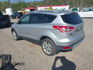 2016 Ford Escape Titanium with VIN 1FMCU9JX2GUA50916, listed as a IAAI auction lot 42118711 with 121,405 mi miles. Bid and sale history available at carsss.com. Image 3.