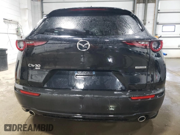 2024 Mazda CX-30 S Premium with VIN 3MVDMBDMXRM674650, listed as a Copart auction lot 54231405 with 7,428 mi miles and Non repairable. Bid and sale history available at DreamBid. Image 6.