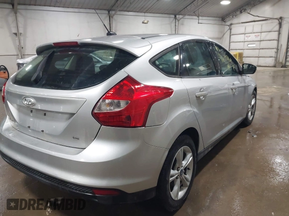 2014 Ford Focus SE with VIN 1FADP3K28EL424177, listed as a IAAI auction lot 41677768 with 104,279 mi miles. Bid and sale history available at carsss.com. Image 4.