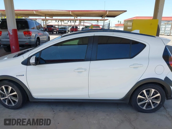 2018 Toyota Prius One with VIN JTDKDTB32J1600004, listed as a IAAI auction lot 42030186 with 61,568 mi miles and . Bid and sale history available at DreamBid. Image 13.