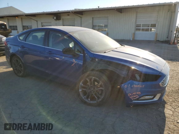 2018 Ford Fusion SE z VIN 3FA6P0H71JR107704, wystawiony jako Copart lot #75017244 z przebiegiem 202 999 mil mil oraz Nie do naprawy • Non repairable. Historia ofert i sprzedaży dostępna na DreamBid. Obrazek 4.