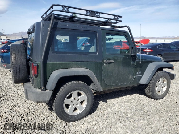 2009 Jeep Wrangler X with VIN 1J4FA24169L707695, listed as a Copart auction lot 49861955 with 89,807 mi miles and Salvage Title. Bid and sale history available at DreamBid. Image 3.