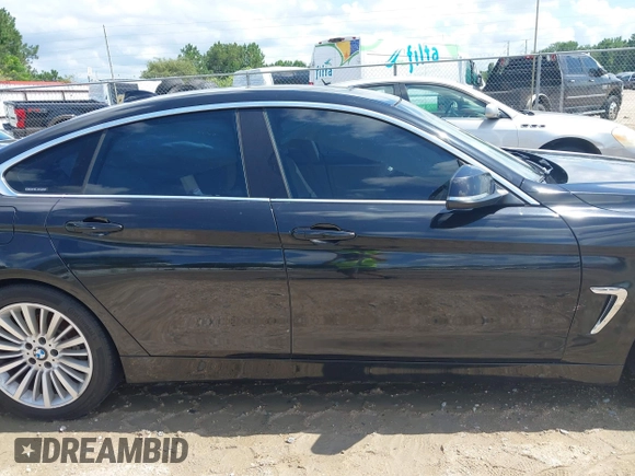 2015 BMW 4 Series 428i с VIN WBA4A5C51FG052589, выставлен на аукционе IAAI как лот 42354325 с пробегом Не указан миль и . История ставок и продаж доступна на DreamBid. Изображение 14.