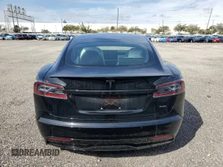 2022 Tesla Model S Plaid z VIN 5YJSA1E64NF461218, wystawiony jako Copart lot #84467644 z przebiegiem Nie podano mil oraz Szkoda całkowita • Salvage title. Historia ofert i sprzedaży dostępna na DreamBid. Obrazek 6.
