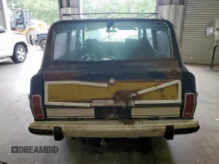 1986 Jeep Grand Wagoneer с VIN 1JCNJ15U5GT147524, выставлен на аукционе Copart как лот 57421255 с пробегом 112 292 миль миль и Списание • Salvage title. История ставок и продаж доступна на DreamBid. Изображение 6.