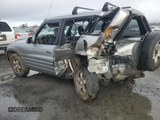2000 Toyota RAV4 with VIN JT3HP10V7Y7169097, listed as a Copart auction lot 43357225 with 295,509 mi miles and Salvage title. Bid and sale history available at DreamBid. Image 2.