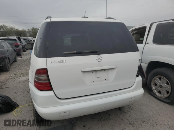 2000 Mercedes-Benz M-Class with VIN 4JGAB54E2YA170332, listed as a Copart auction lot 73206804 with 121,910 mi miles and Non Repairable. Bid and sale history available at carsss.com. Image 6.