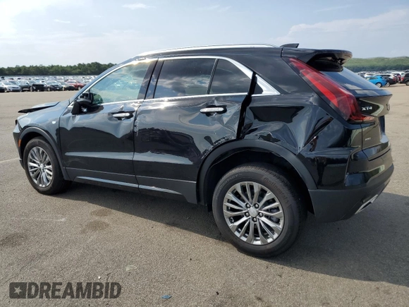 2024 Cadillac XT4 AWD Premium Luxury with VIN 1GYFZDR49RF112460, listed as a Copart auction lot 67183524 with 12,396 mi miles and Salvage title. Bid and sale history available at DreamBid. Image 2.