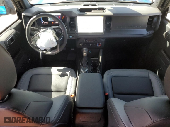2024 Ford Bronco Big Bend z VIN 1FMDE7BH9RLB50114, wystawiony jako Copart lot #52157635 z przebiegiem 1 002 mil mil oraz Szkoda całkowita • Salvage title. Historia ofert i sprzedaży dostępna na DreamBid. Obrazek 8.