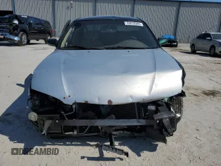 1999 Mazda 626 ES with VIN 1YVGF22C1X5896686, listed as a Copart auction lot 72012584 with 123,672 mi miles and Salvage Title. Bid and sale history available at carsss.com. Image 5.