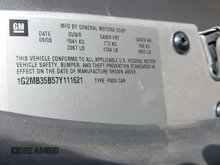2007 Pontiac Solstice z VIN 1G2MB35B57Y111621, wystawiony jako IAAI lot #41332760 z przebiegiem 49 784 mil mil oraz . Historia ofert i sprzedaży dostępna na DreamBid. Obrazek 9.