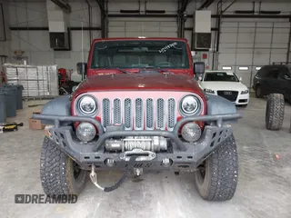 2008 Jeep Wrangler Rubicon z VIN 1J8GA69178L630840, wystawiony jako IAAI lot #42483010 z przebiegiem 145 196 mil mil oraz . Historia ofert i sprzedaży dostępna na DreamBid. Obrazek 13.