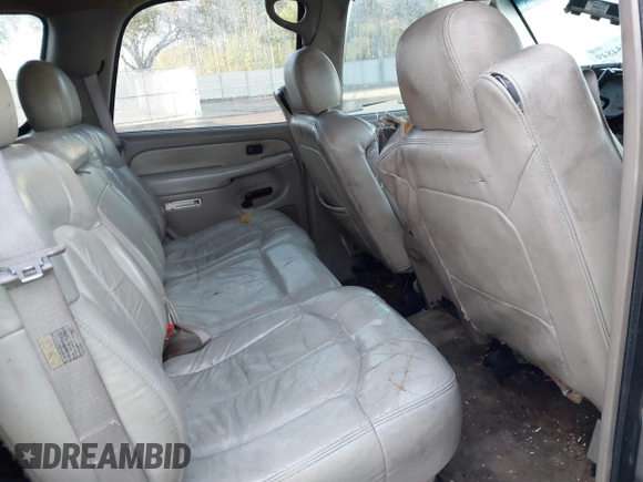 2003 Chevrolet Tahoe LS z VIN 1GNEC13Z73R121712, wystawiony jako IAAI lot #41754849 z przebiegiem Nie podano mil oraz . Historia ofert i sprzedaży dostępna na DreamBid. Obrazek 8.