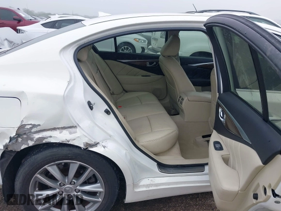 2014 Infiniti Q50 Premium z VIN JN1BV7AP4EM676324, wystawiony jako IAAI lot #42167934 z przebiegiem 114 670 mil mil oraz . Historia ofert i sprzedaży dostępna na DreamBid. Obrazek 8.
