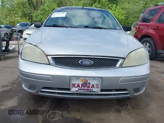 2007 Ford Focus S with VIN 1FAFP31N97W218727, listed as a IAAI auction lot 42183392 with 135,456 mi miles and . Bid and sale history available at carsss.com. Image 6.