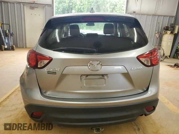 2013 Mazda CX-5 Sport with VIN JM3KE2BE6D0110272, listed as a Copart auction lot 57570725 with 124,475 mi miles and Salvage title. Bid and sale history available at DreamBid. Image 6.