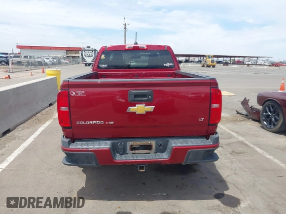 2018 Chevrolet Colorado 2WD LT with VIN 1GCHSCEN6J1168868, listed as a IAAI auction lot 42379942 with 57,857 mi miles and . Bid and sale history available at DreamBid. Image 16.