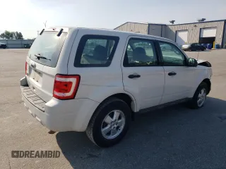 2010 Ford Escape XLS with VIN 1FMCU0C76AKB82752, listed as a Copart auction lot 57626565 with 194,931 mi miles and Salvage title. Bid and sale history available at DreamBid. Image 3.