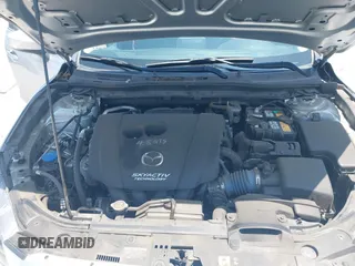 2018 Mazda 3 Touring z VIN 3MZBN1V35JM272638, wystawiony jako IAAI lot #42458722 z przebiegiem 98 393 mil mil oraz . Historia ofert i sprzedaży dostępna na DreamBid. Obrazek 10.